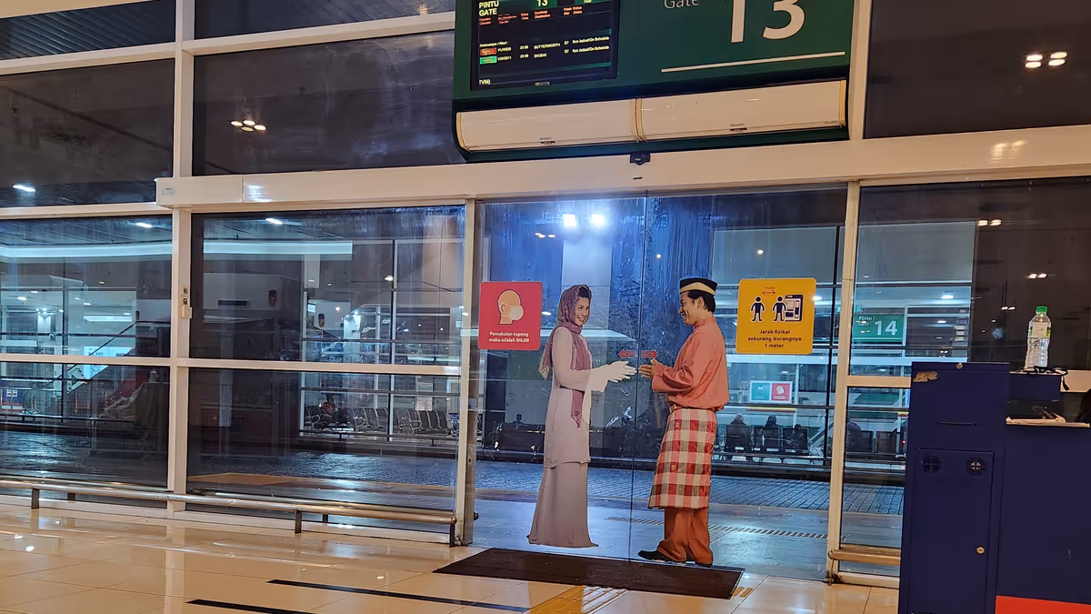 A glass door with a printing of a man and a woman.