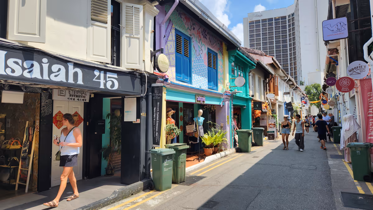 Colorful shoplots along the street during the day.