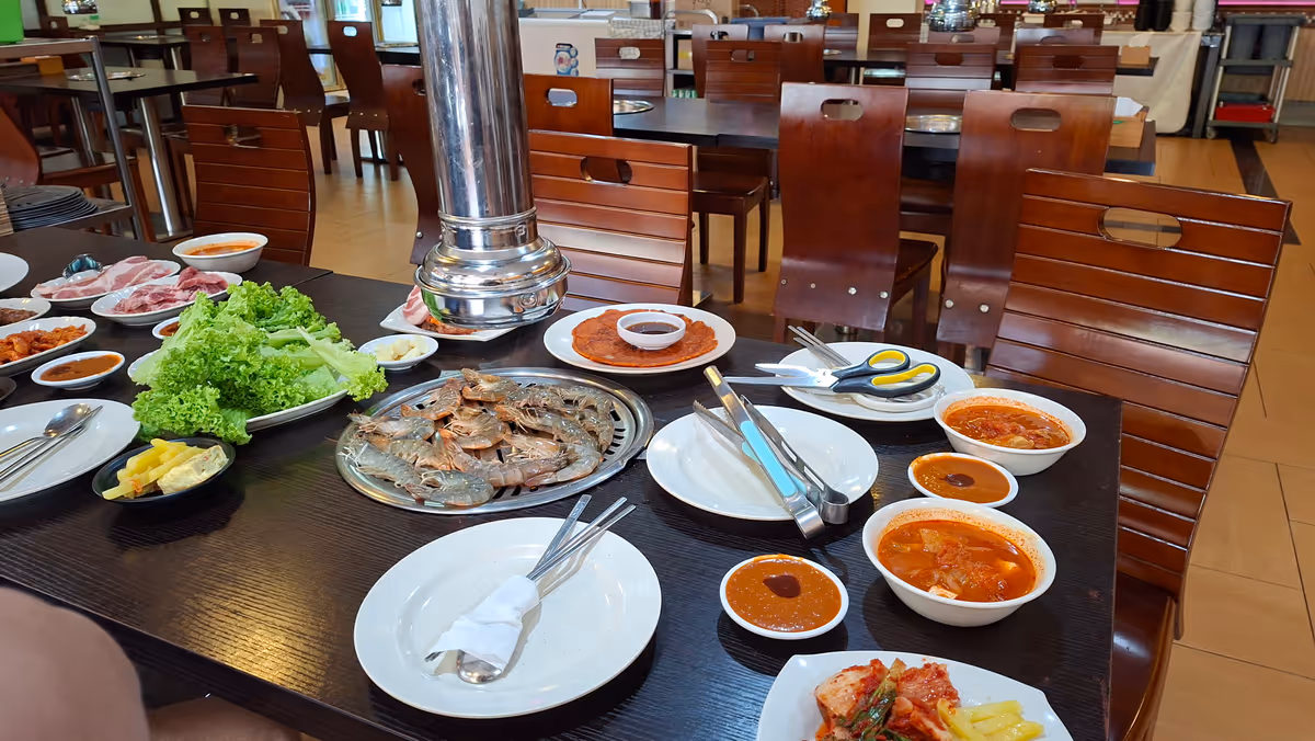 Raw food, sauce and utensil for bbq grill on the table