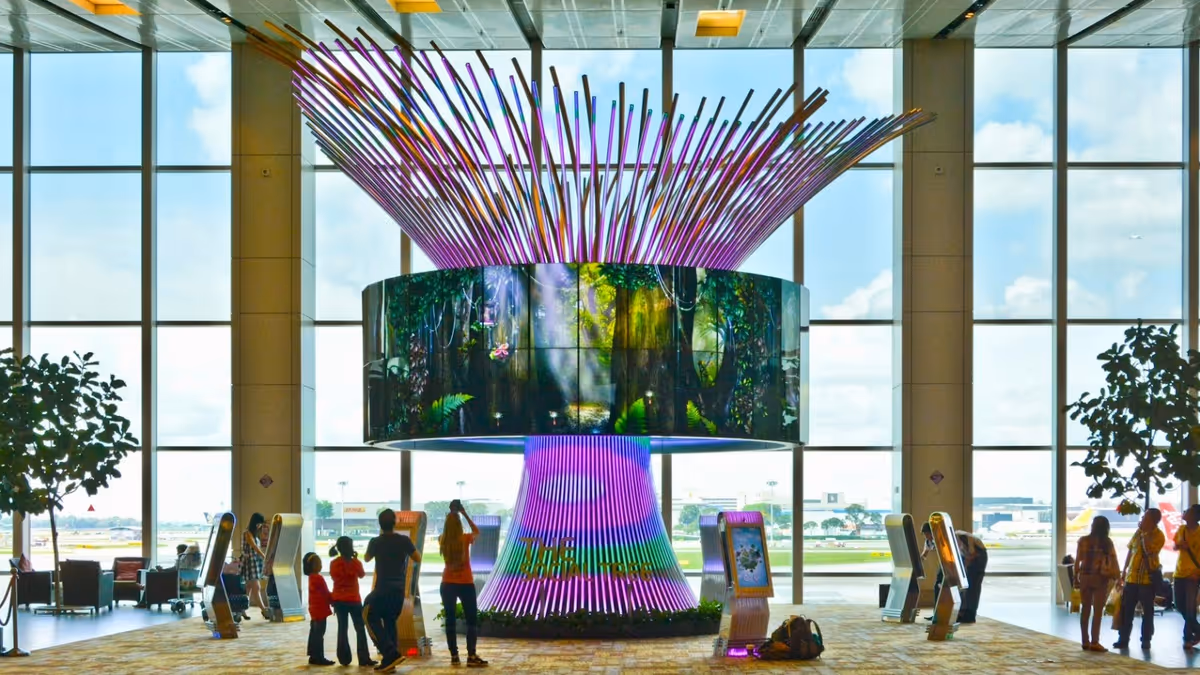 Singapore Changi Airport Social Tree, Kiosks with an electronic tree shape with 360 degree screen.